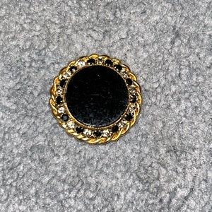 Black gold tone vintage brooch